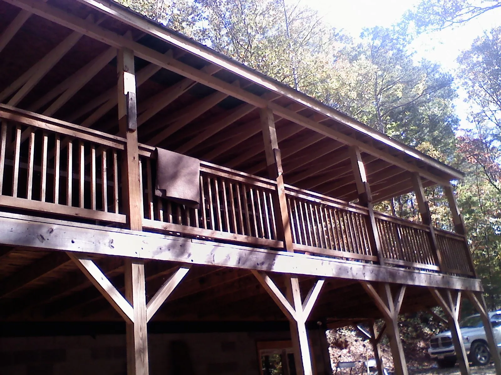 Timber framing under a new elevated porch and deck — Roof Leak Repair in Stillman Valley by Roofing Brothers